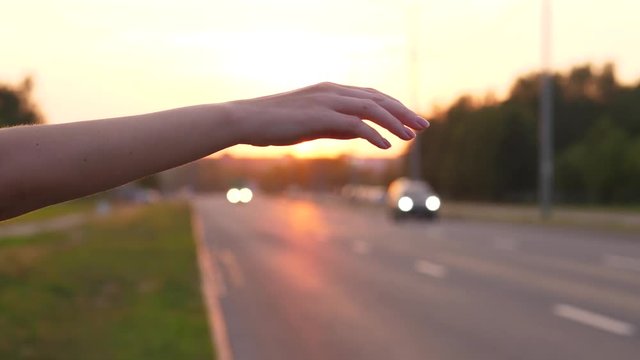 Hitchhiking Young Woman Hand