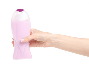 Pink purple bottle shower gel in hand on a white background isolation