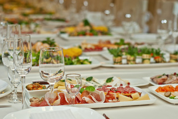 delicious dishes on the table in the restaurant. serving table.