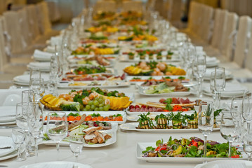 delicious dishes on the table in the restaurant. serving table.