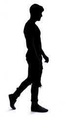 silhouette of a young man naked with jeans