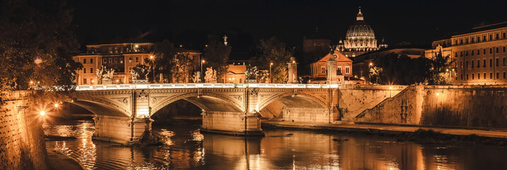 panorama View of the Cathedral of St. Peter, the Bridge of the Holy Angel, Tiber, Rome at night