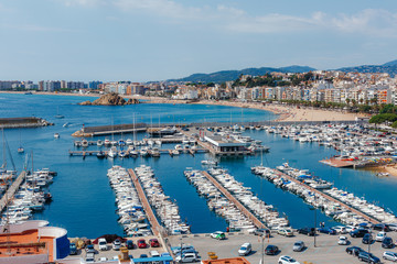 Fototapeta premium Panoramic aerial view of Blanes in Costa Brava in a beautiful summer day, Spain 