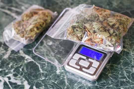 on the scales is a marijuana bag