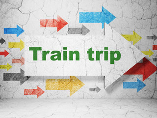 Tourism concept:  arrow with Train Trip on grunge textured concrete wall background, 3D rendering