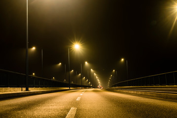 Misty empty bridge at night, Foggy empty Bridge at night, wet road at night