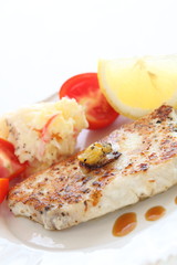 Homemade sword fish fillet sauteed with mango sauce