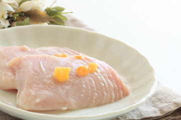 prepared sword fish fillet seasoning with mango and yogurt
