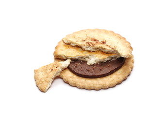 Chocolate cookies with crumbs isolated on white background