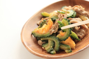 Chinese food, bitter melon and pork stir fried with egg