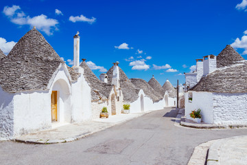 Alberobello's famous Trulli, the characteristic cone-roofed houses of the Itria Valley, Apulia,...
