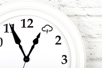 Weather forecast concept with clock showing the weather