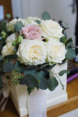wedding bouquet of flowers with white roses and pink peonies