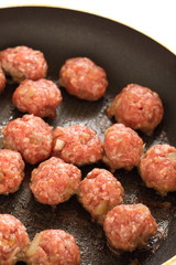 homemade meat ball on frying pan