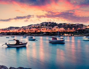 Splendid spring scene of the Nuevo Loca Beach, Aegean sea. Dramatic evening view of the Anavyssos town, Greece, Europe. Traveling concept background. Artistic style post processed photo.