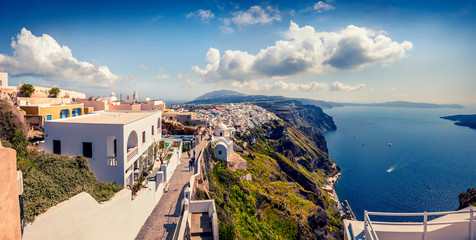 Sunny morning panorama of Santorini island. Great spring view of the famous Greek resort Fira,...