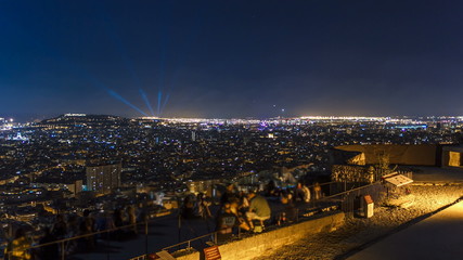 View of Barcelona timelapse, the Mediterranean sea, montjuic mountain from Bunkers Carmel. Catalonia, Spain.