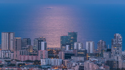 View of Barcelona skyline timelapse, the Mediterranean sea and buildings from Bunkers Carmel. Catalonia, Spain.