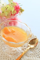 Homemade orange jelly in glass bowl for dessert imag