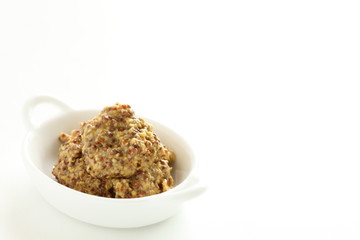 Mustard sauce on white background