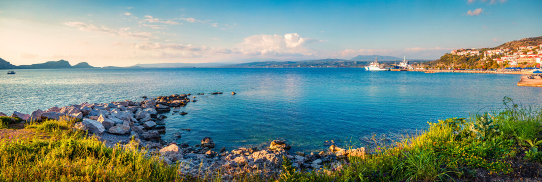 Picturesque morning view of Pilos town. Colorful spring scene of the Ionian Sea. Beautiful countryside panorama of Greece. Traveling concept background. Artistic style post processed photo.