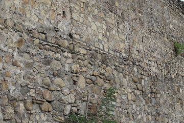 High stone wall