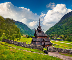 Fototapeta na wymiar Picturesque summer view of Borgund Stave Church, located in the village of Borgund in the municipality of Lerdal in Sogn og Fjordane county, Norway. Traveling concept background.