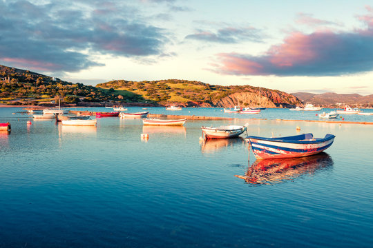 Splendid spring scene of the Nuevo Loca Beach, Aegean sea. Wonderful evening view of the Anavyssos town, Greece, Europe. Traveling concept background.