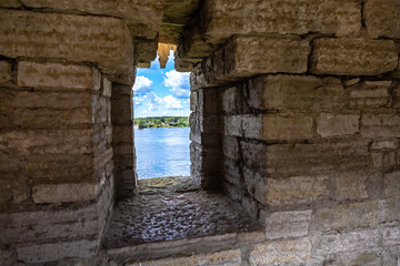 Fototapeta premium View through the window of the fortress wall of ancient Oreshek fortress