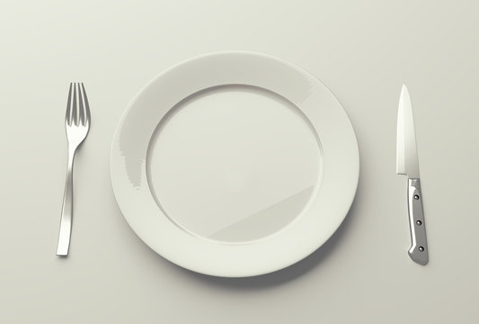 empty plate with fork and knife