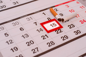15 november no smoking day. The calendar marked the date and lies broken cigarette