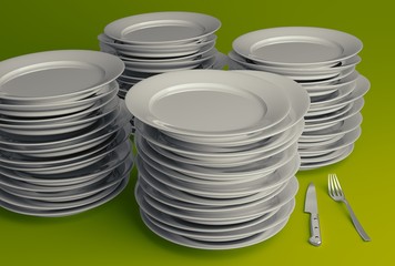 stack of plates on green background