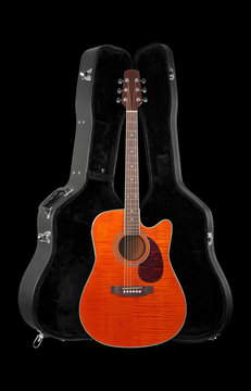 Musical instrument - Front view orange electro acoustic guitar in hard case isolated