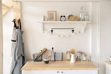 Furniture and dishware in kitchen