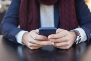 Man with smart phone on hands