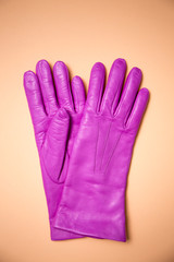 pink gloves on burgundy