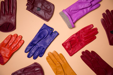 multicolored gloves on a beige background