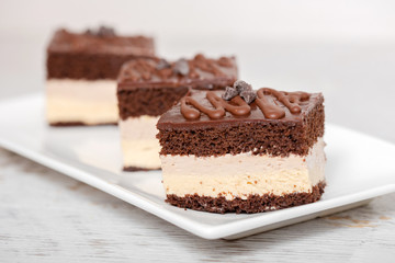 Chocolate and cream cake on plate