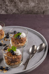 Glass cups of chocolate and chestnuts mousse