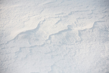 Abstract fresh snow texture background. snow texture background with copy space. waves in the snow.