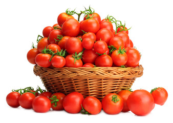 Ripe cherry tomatoes on a white background