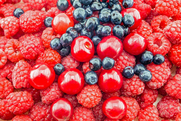 blueberries, raspberries and cherry shot top down