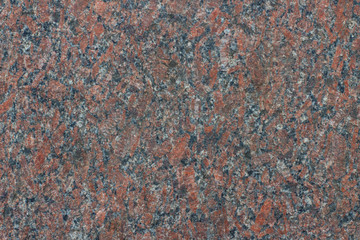 Red granite, which is used in construction.