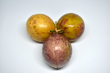 Passion fruits were arranged on a white background.