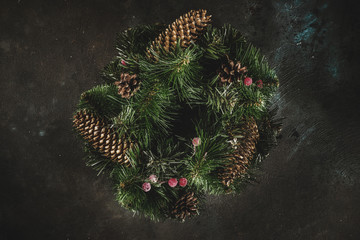 Christmas wreath with balls, pine cones, tree branches