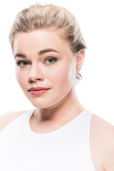 portrait of beautiful young woman looking at camera isolated on white