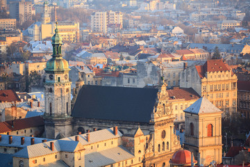 Old town with a church in the center, Lviv city, Ukraine. Bell Tower of the Bernardine Monastery.