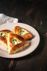 triangle pie with onion and egg