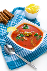 bowl of soup. solyanka (soup with lemon and olive)