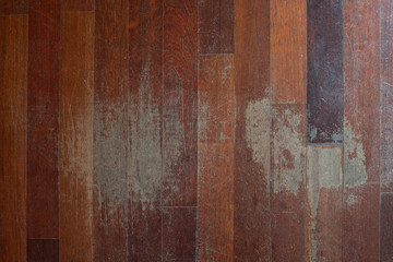 Old scratched hardwood flooring in need of maintenance. parquet ruined by scratches made by...